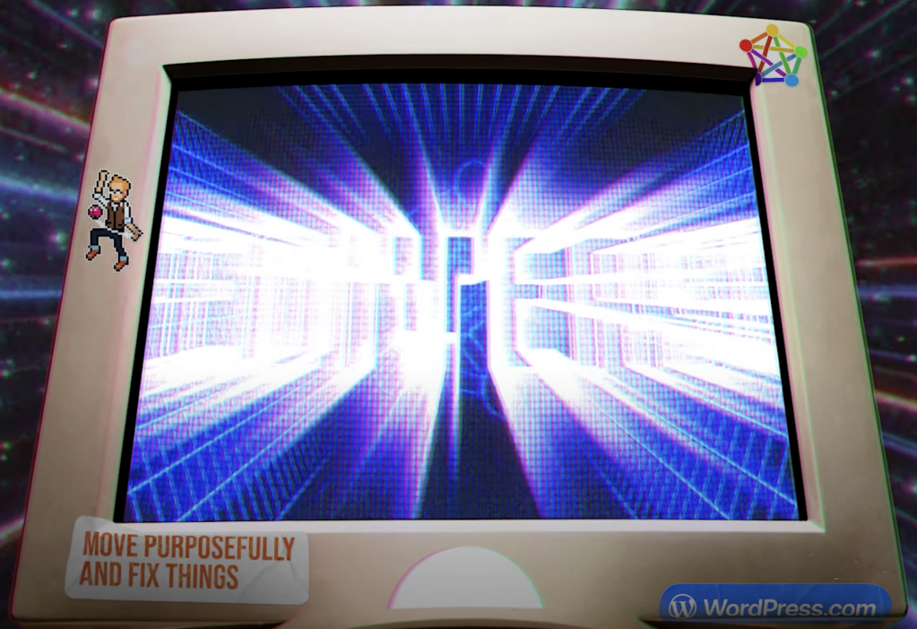 Image showing a computer with stickers on it, including "Move Purposefully and Fix Things" by Doc Pop.